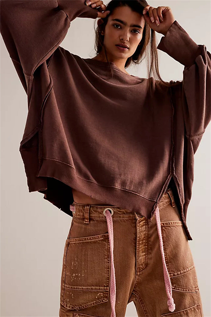 Damen oversized Sweatshirt mit Ballonärmeln, offenen Saumnähten und seitlichen Schlitzen Drune