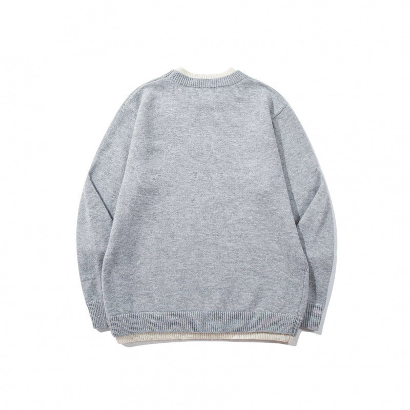 Unisex Feinstrickpullover mit Raglannaht und dreieckigem Saumbesatz Drune