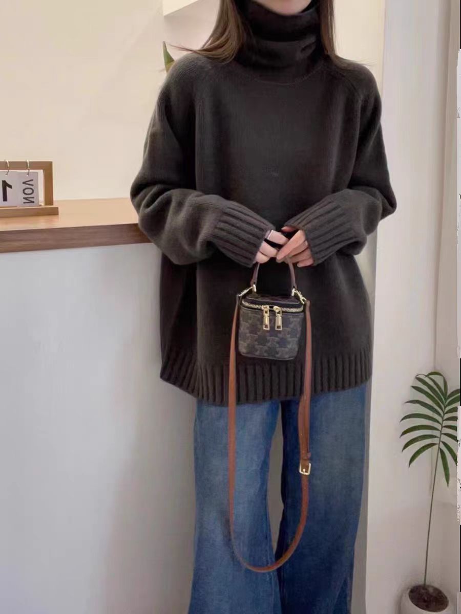 Damen Grobstrickpullover mit Stehkragen und seitlichen Schlitzen Drune