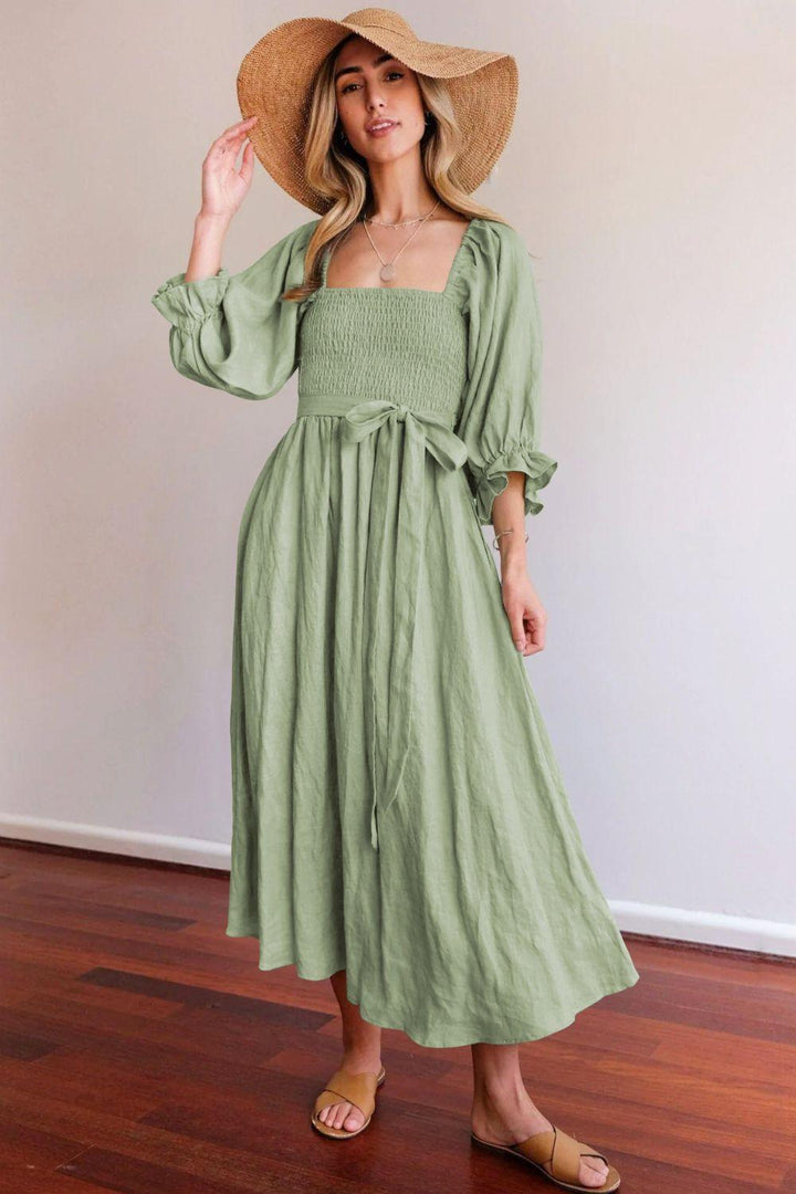 Damen elegantes, tailliertes Maxikleid mit Puffärmeln und Bindegürtel Drune