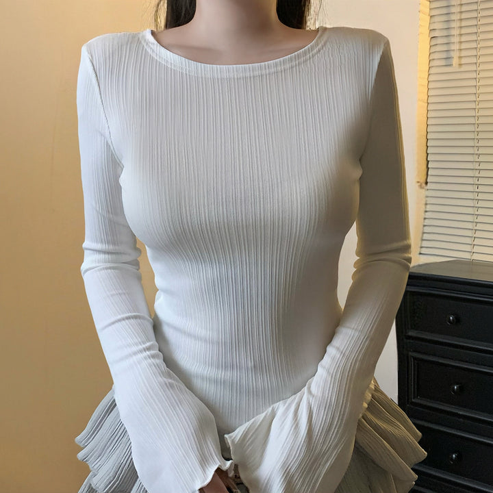 Damen Figurbetontes geripptes Longsleeve mit feiner Rippenstruktur und welligem Saum Drune