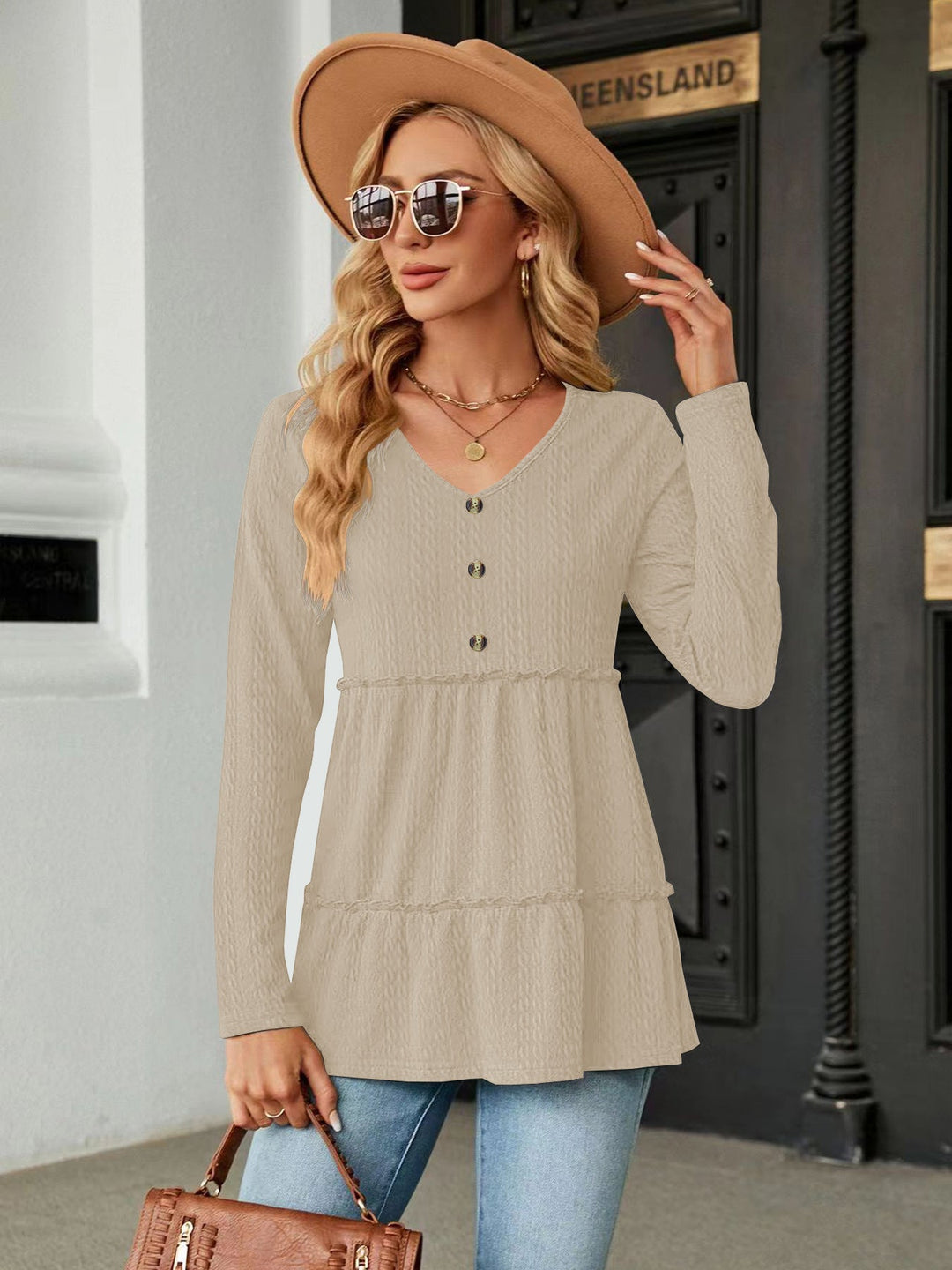 Damen Ärmelloses V-Ausschnitt Shirt mit Knopfdetails und voluminösem Saum Drune