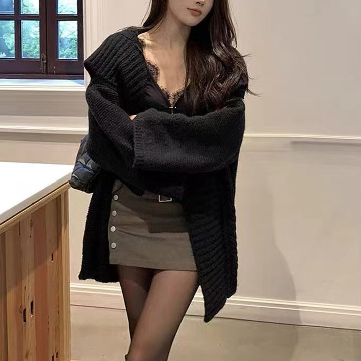 Damen oversized Strickjacke mit voluminösen Ärmeln und strukturierter Oberfläche Drune