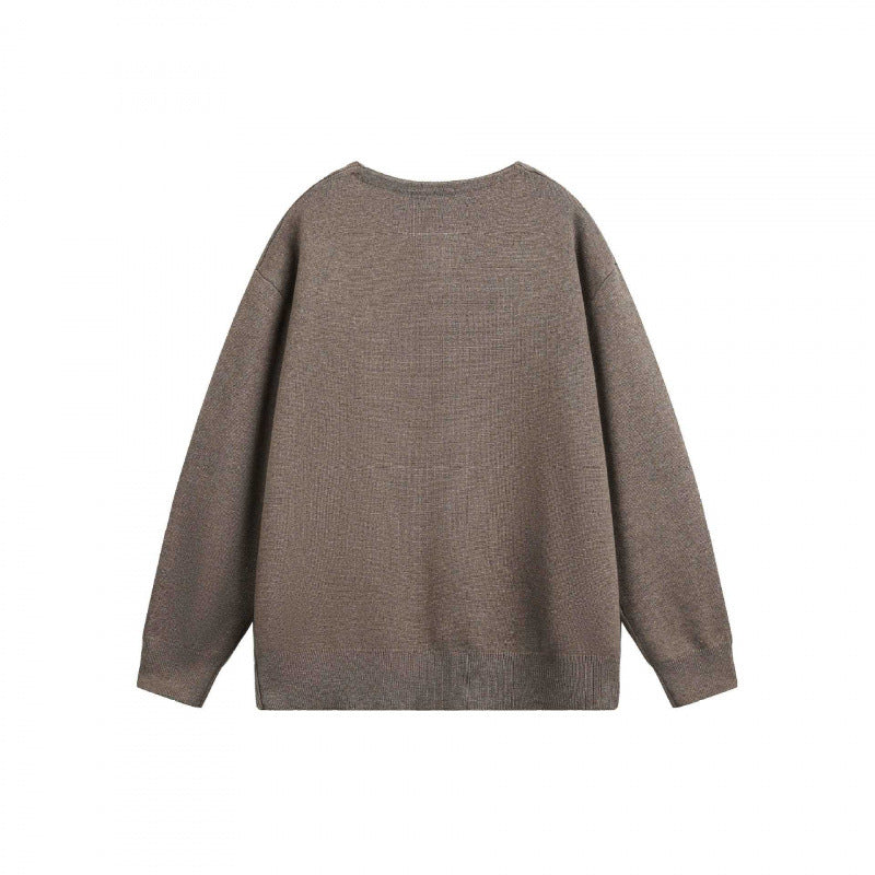 Unisex Oversize-Feinstrickpullover mit kurzem Henleyverschluss und strukturierter Mélange-Qualität Drune