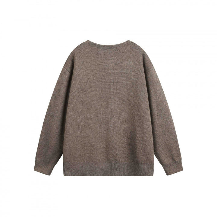 Unisex Oversize-Feinstrickpullover mit kurzem Henleyverschluss und strukturierter Mélange-Qualität Drune