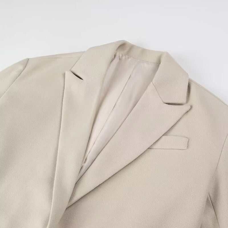 Damen Langmantel mit langem Fransen‑Saum, kastiger Oversize‑Silhouette und Reverskragen Drune