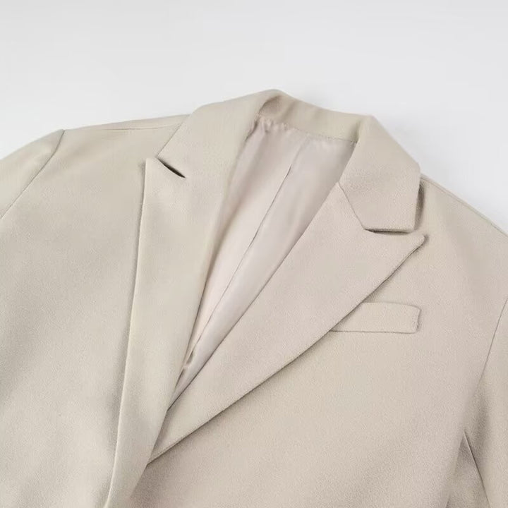 Damen Langmantel mit langem Fransen‑Saum, kastiger Oversize‑Silhouette und Reverskragen Drune