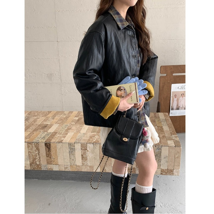 Damen modische Lederjacke mit kariertem Futter Drune