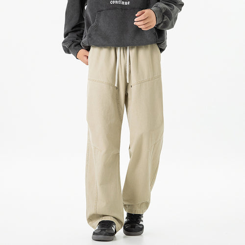 Herren weite Baggy-Cargohose aus gewaschenem Canvas mit Elastikbund und dekorativen Nahtpaneelen Drune