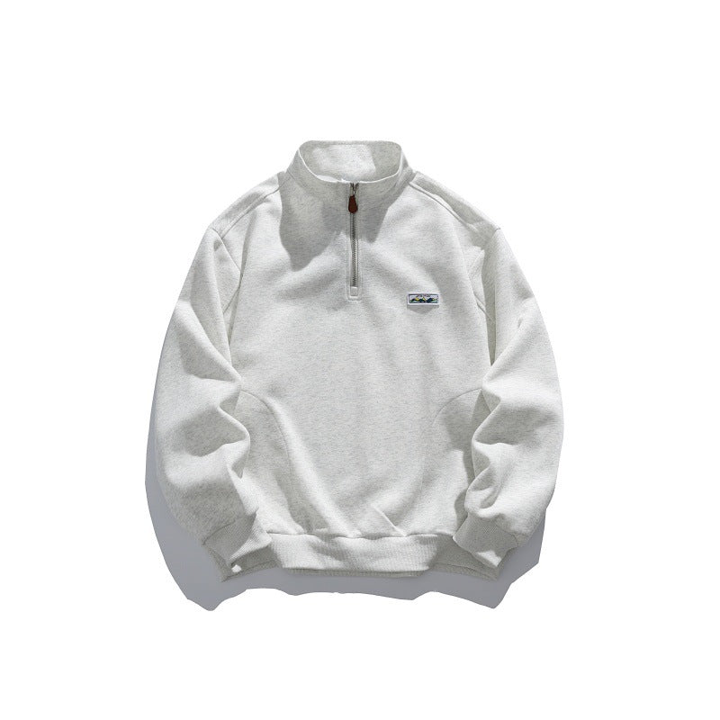 Unisex Halbzip-Sweatshirt mit Stehkragen, Raglanärmeln und minimalistischer Brustpatch Drune