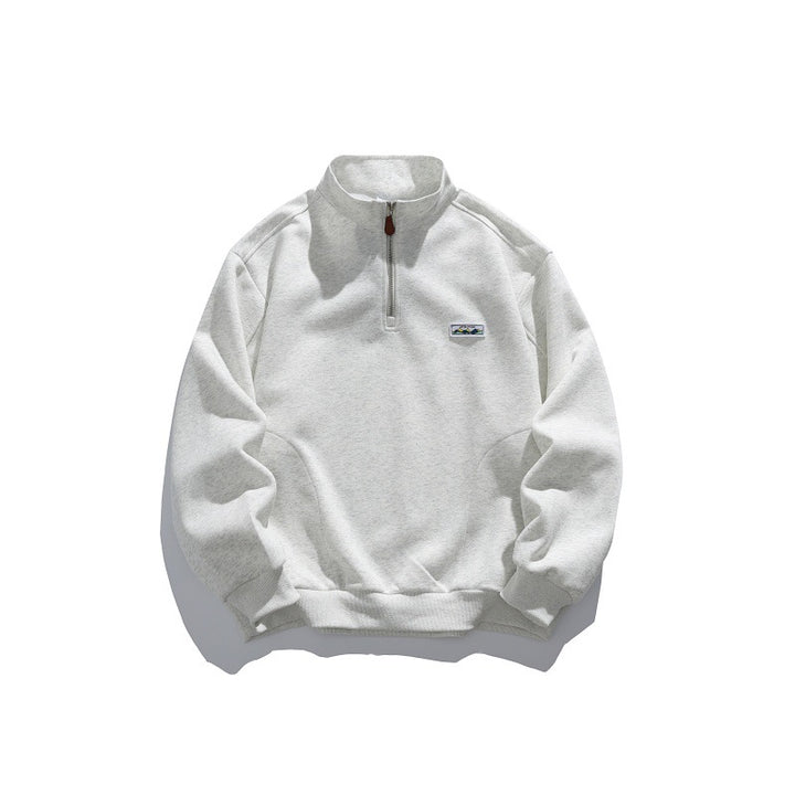 Unisex Halbzip-Sweatshirt mit Stehkragen, Raglanärmeln und minimalistischer Brustpatch Drune