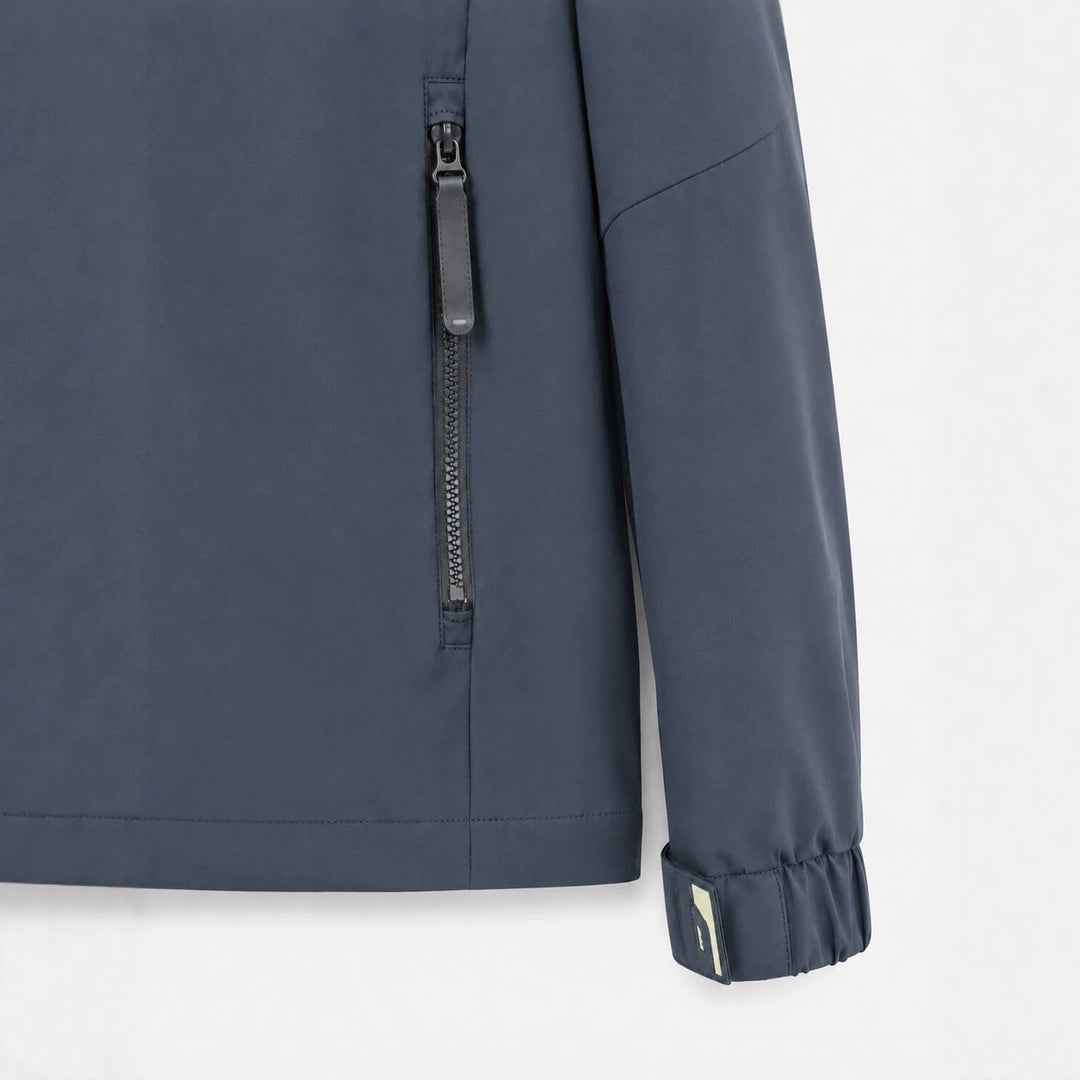 Herren Leichte wasserabweisende Kapuzen‑Softshelljacke mit Reißverschlusstaschen Drune
