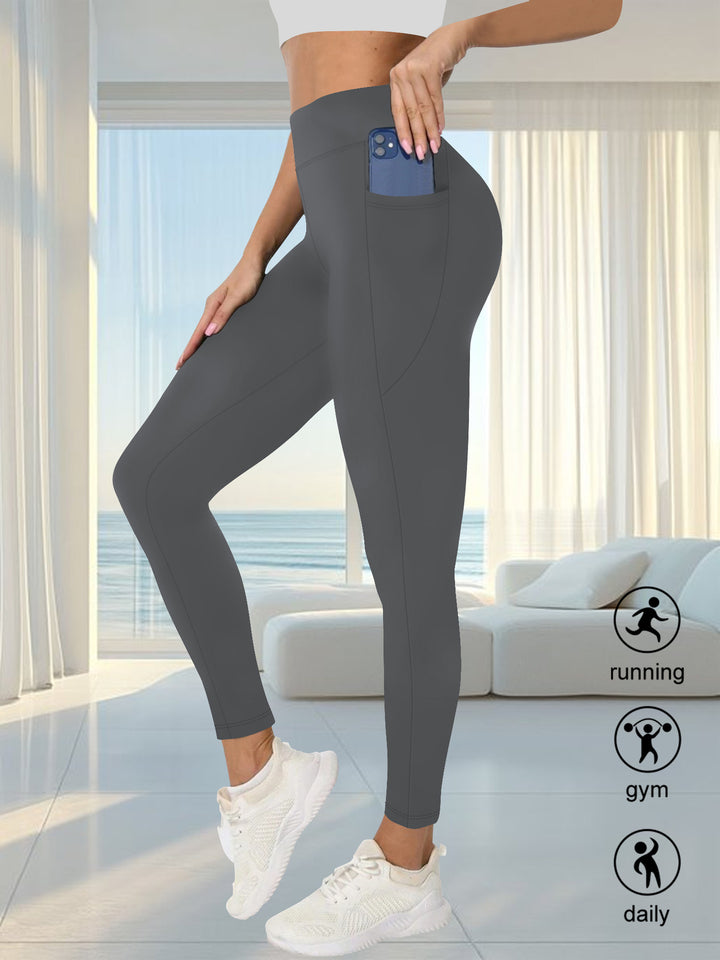 Damen High-Waist Sportleggings mit seitlicher Handytasche und formendem Kompressionsstoff Drune