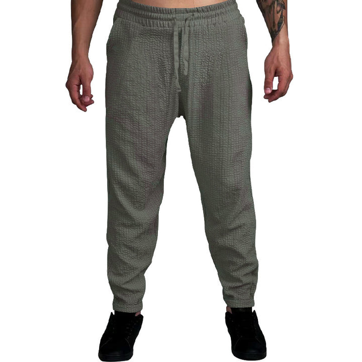 Herren Texturierte tapered Jogginghose mit Elastikbund, Tunnelzug & gerippten Knöchelbündchen Drune
