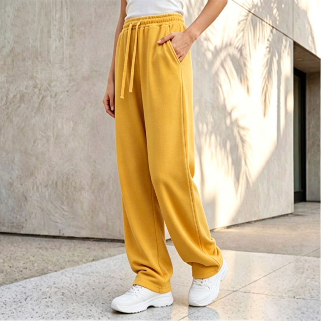 Damen nan weite Loungepalazzo-Hose mit hohem Komfortbund, Kordelzug, seitlichen Eingrifftaschen und dekorativer Seitennaht Drune