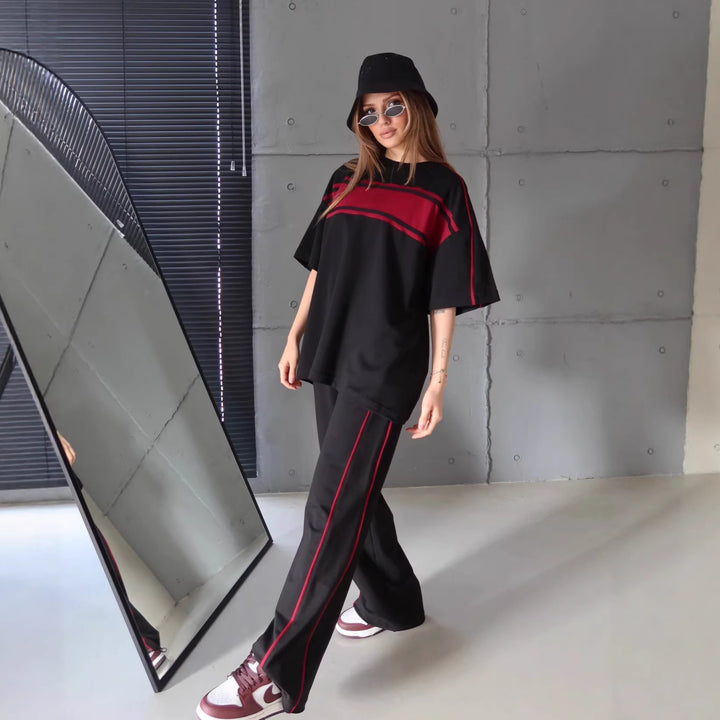 Damen stylisches Sportanzug-Set mit weitem Schnitt und kontrastierenden Streifen