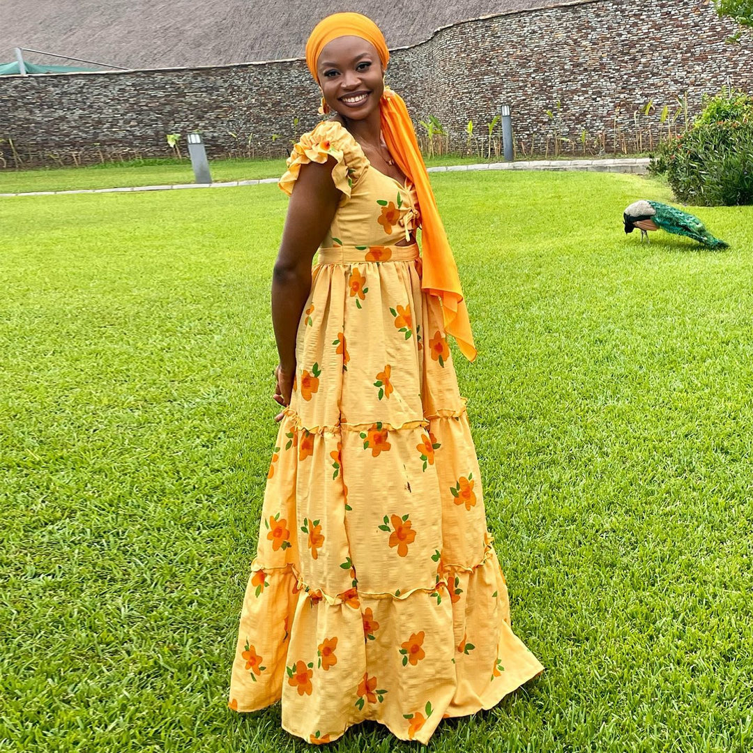 Damen Maxikleid mit voluminösen Rüschen und floralen Akzenten Drune