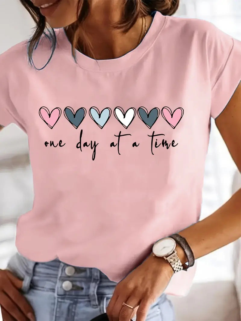 Damen Casual Grafik T-Shirt mit Herzdesign und inspirierendem Zitat Drune