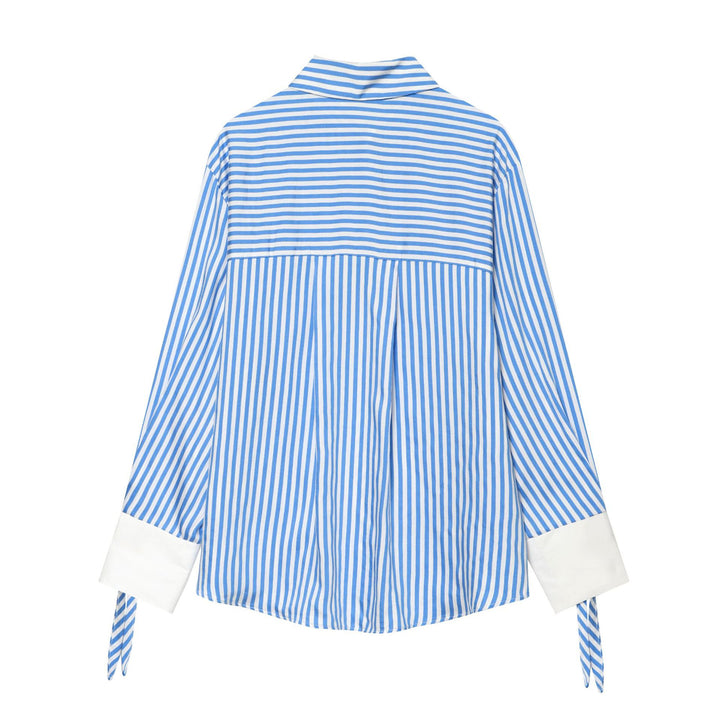 Damen nan oversized Hemdbluse mit Kentkragen, durchgehender Knopfleiste, markanten Manschetten mit Schnürdetail und feinem Streifenmuster Drune
