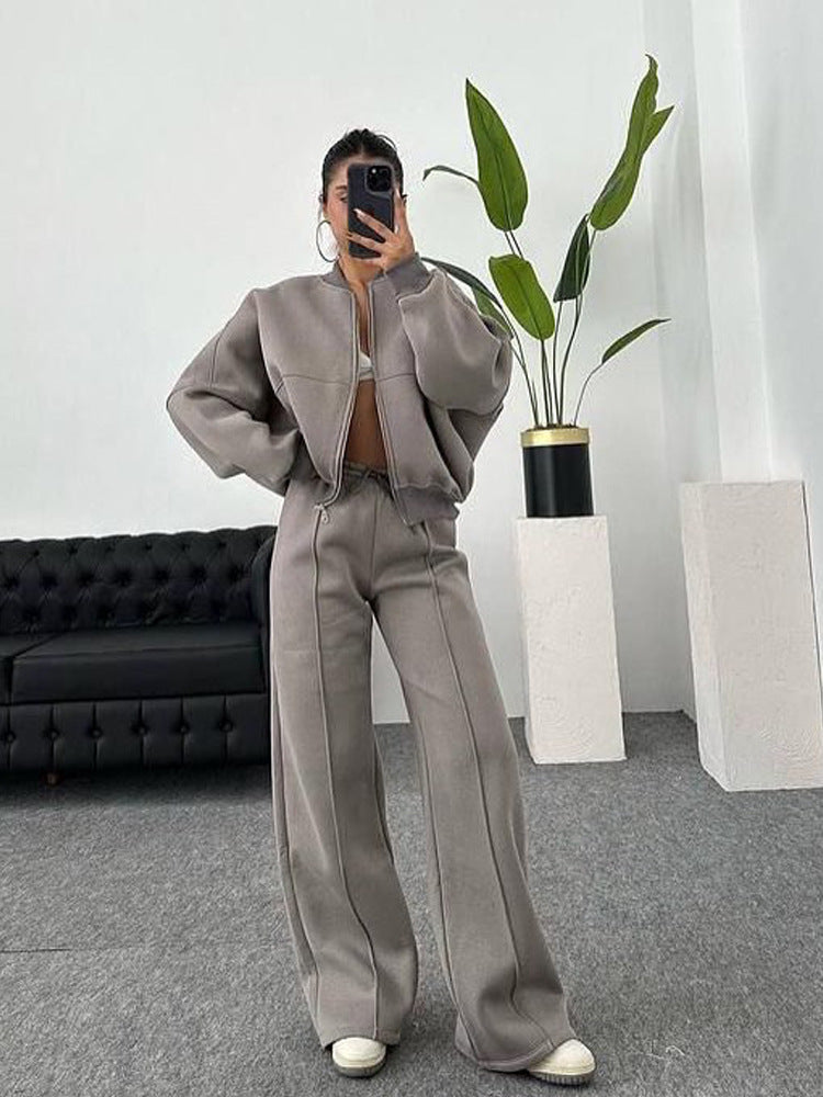 Damen sportive Oversize-Fleecejacke mit diagonaler Reißverschluss-Optik und weit geschnittener High-Waist-Jogginghose Drune