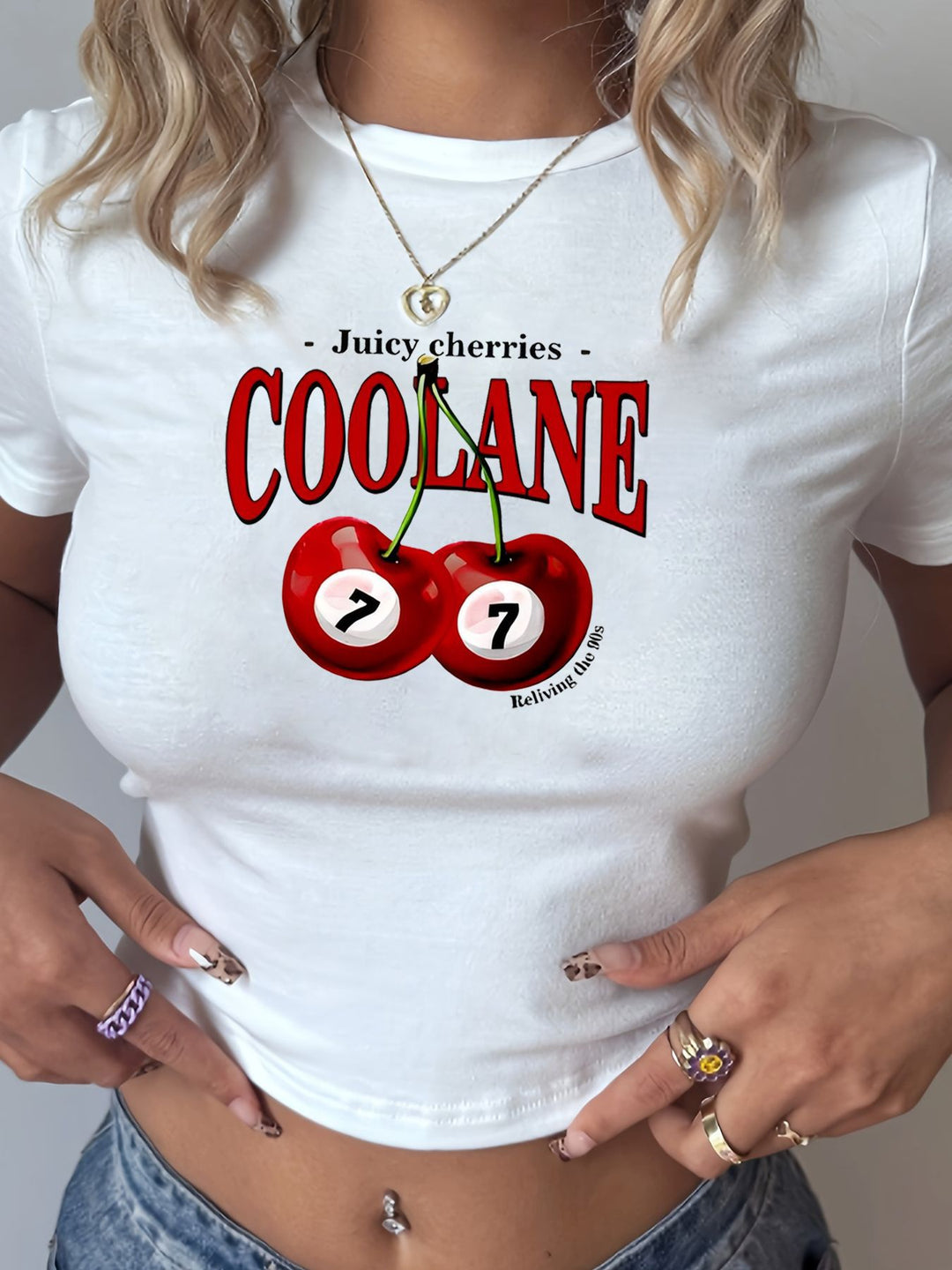 Damen T-Shirt mit kreativem Schlüsselherz-Motiv und modernem Print Drune