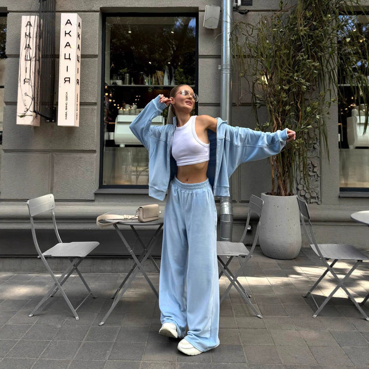 Damen sportive Oversize-Fleecejacke mit diagonaler Reißverschluss-Optik und weit geschnittener High-Waist-Jogginghose Drune