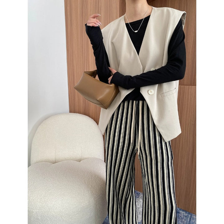 Damen elegante Weste mit asymmetrischem Schnitt und praktischen Taschen Drune