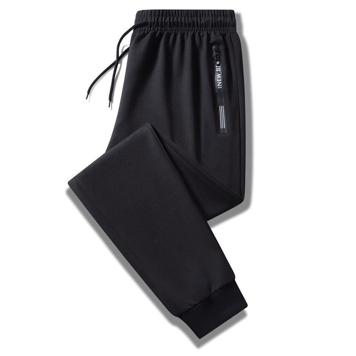 Herren Sportliche Trainingshose mit elastischem Tunnelzugbund, Reißverschlusstasche und glattem Performance‑Material Drune