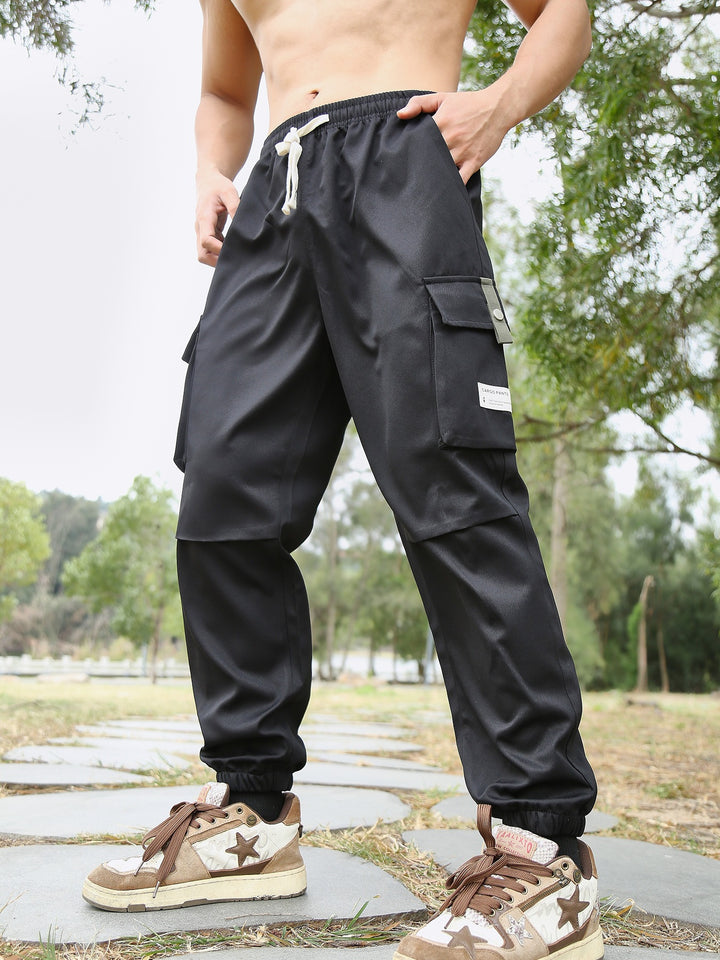 Herren Multifunktionale Cargo-Joggerhose mit elastischem Tunnelzugbund, verschließbaren Beintaschen und verstärkten Knieeinsätzen Drune