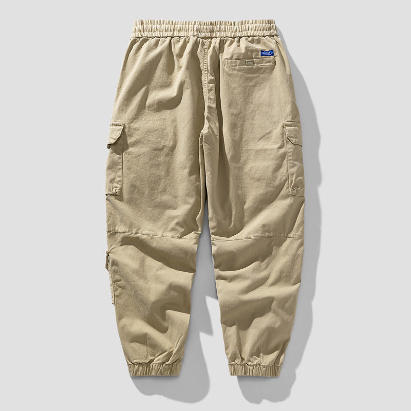 Herren Leichte Canvas-Cargohose im Joggerstil mit elastischem Bund, segmentierten Kniepaneelen und verdeckten Klappentaschen Drune