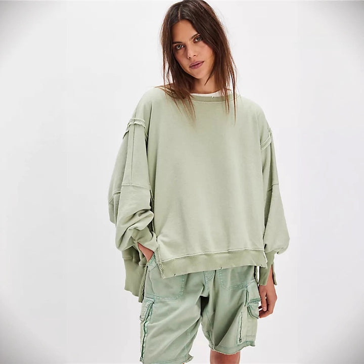 Damen oversized Sweatshirt mit Ballonärmeln, offenen Saumnähten und seitlichen Schlitzen Drune