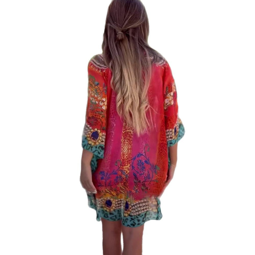 Damen Strandkleid im farbenfrohen Boho-Stil mit verspieltem Design und tiefem V-Ausschnitt Drune