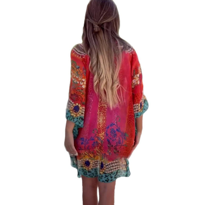 Damen Strandkleid im farbenfrohen Boho-Stil mit verspieltem Design und tiefem V-Ausschnitt Drune