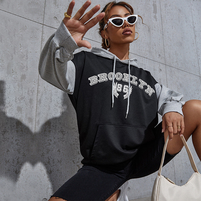 Damen Oversize-Kapuzenhoodie im Collegestyle mit Colorblock-Ärmeln, Kängurutasche und Kordelzug Drune
