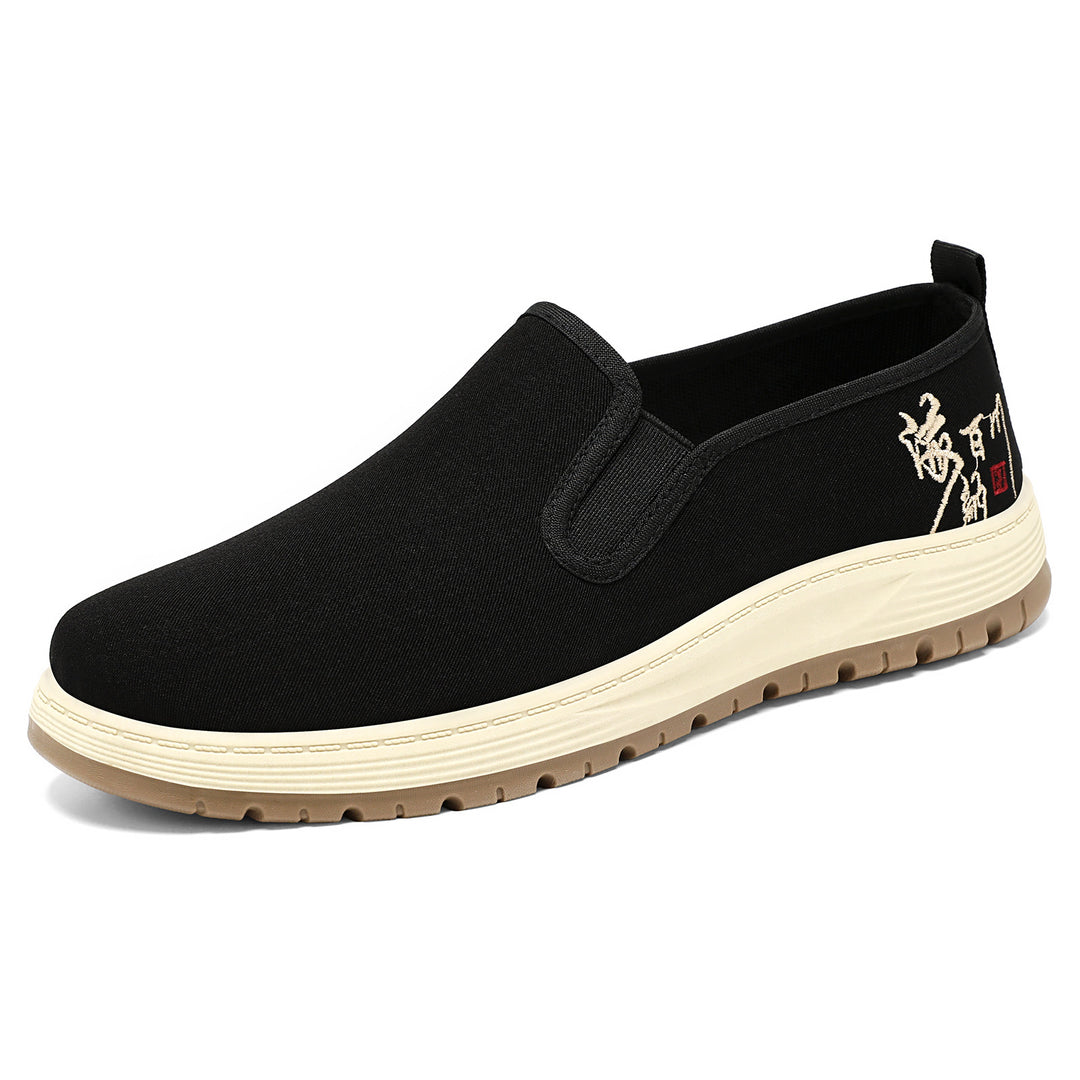 Herren nan nahtloser Canvas-Slip-On mit elastischem Einstieg, besticktem Fersenmotiv und rutschfester EVA-Laufsohle Drune