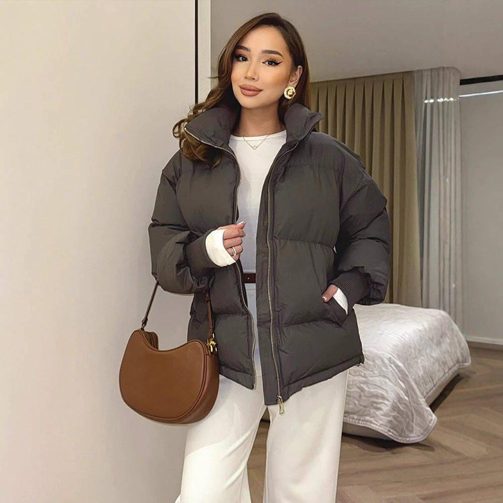Damen Kurze taillierte Pufferjacke mit Rippbündchen und hohem Stehkragen Drune