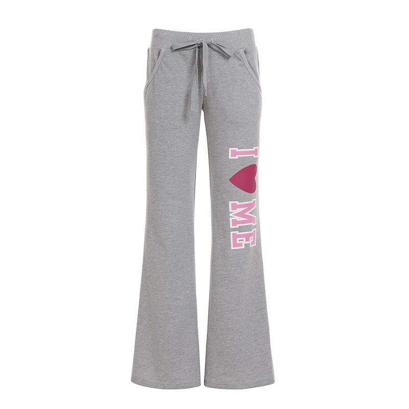 Damen nan weiche Flared-Jogginghose mit Kordelzug, Eingrifftaschen und auffälligem Love-Print Drune