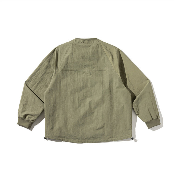 Unisex Leichte Boxy-Fieldjacke ohne Kragen mit Raglanärmeln, aufgesetzten Klappentaschen und Kordelzug Drune