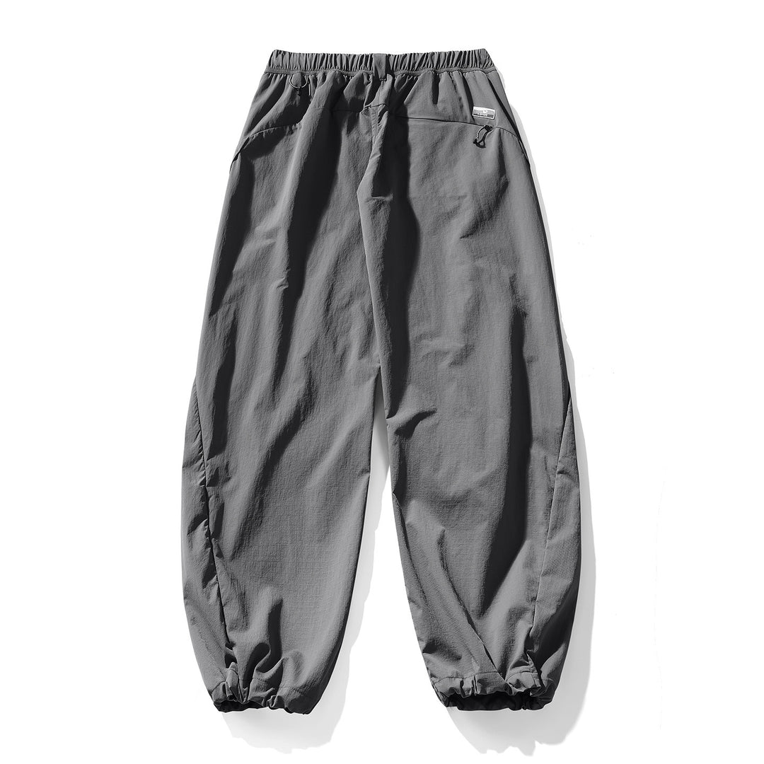 Herren Baggy-Cargohose mit asymmetrischen Eingriffstaschen, Tunnelzugbund und elastischen Knöchelabschlüssen Drune