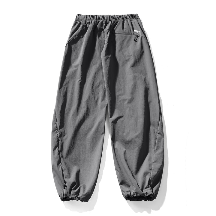 Herren Baggy-Cargohose mit asymmetrischen Eingriffstaschen, Tunnelzugbund und elastischen Knöchelabschlüssen Drune