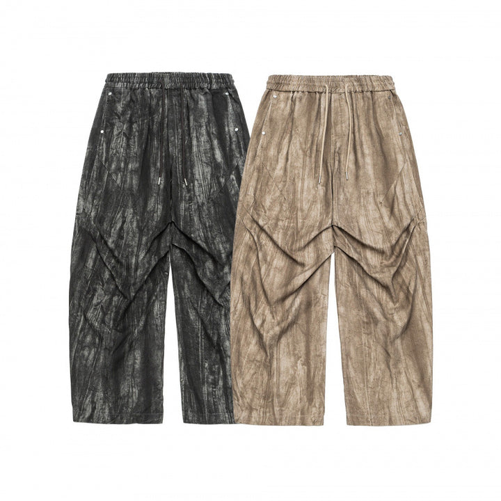 Unisex Weite Cropped-Hose mit asymmetrischen Lageinsätzen, elastischem Bund und beschichteter Struktur Drune