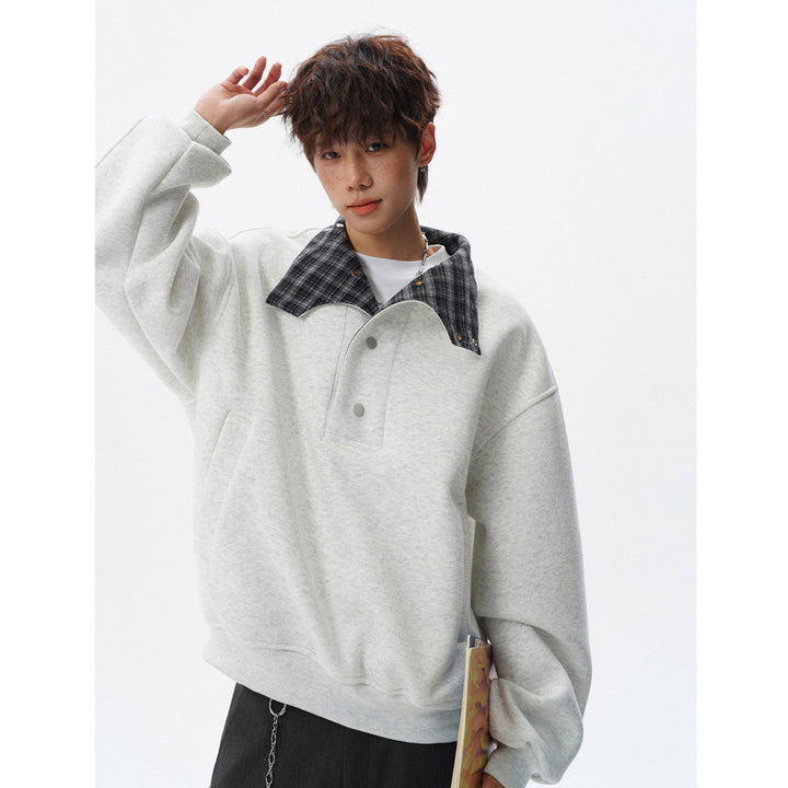 Unisex Oversized Sweatshirt mit abnehmbarem Karo-Kragen und Druckknopfleiste Drune