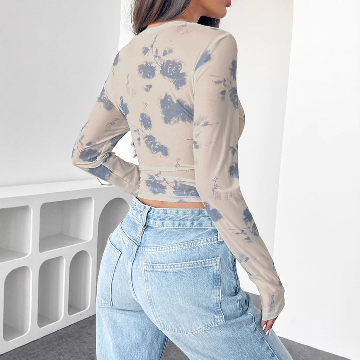 Damen nan figurbetontes tailliertes bauchfreies Mesh-Oberteil mit Rundhals, verlängerten Ärmeln, Daumenlöchern und dezentem Batikmuster Drune