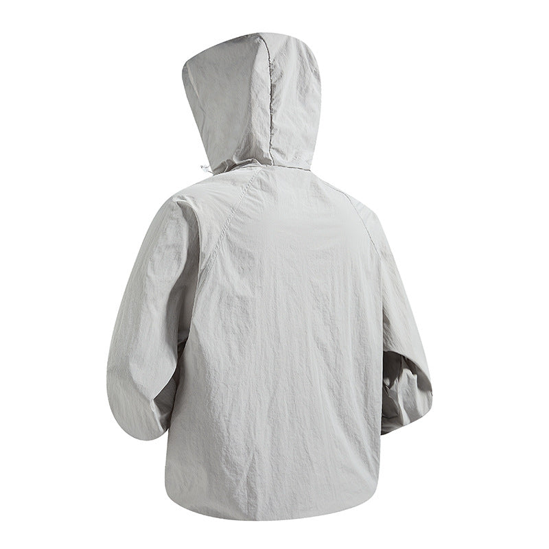 Unisex Leichte packbare Kapuzen‑Windjacke mit wasserabweisender Ripstop‑Hülle und verstellbarer Kapuze Drune