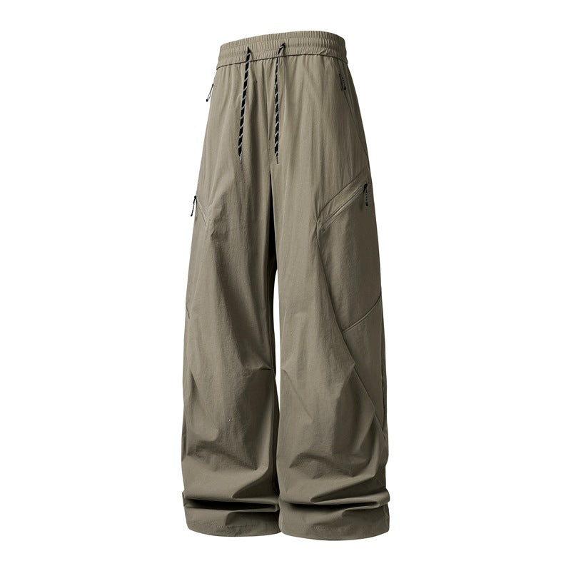 Herren Oversize-Utility-Cargo-Hose aus leichtem Nylon mit elastischem Kordbund, seitlichen Reißverschlusstaschen & weiter Ballon-Silhouette Drune