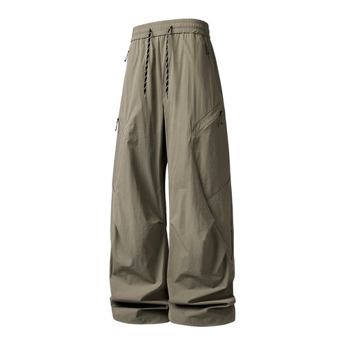 Herren Oversize-Utility-Cargo-Hose aus leichtem Nylon mit elastischem Kordbund, seitlichen Reißverschlusstaschen & weiter Ballon-Silhouette Drune