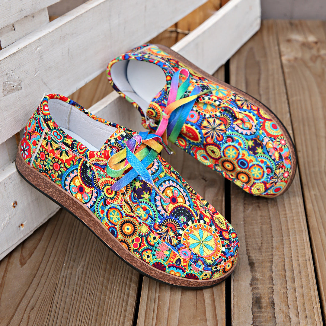 Damen Bequeme Plateau-Slipper im Ethno‑Print mit Korkoptik‑Sohle Drune