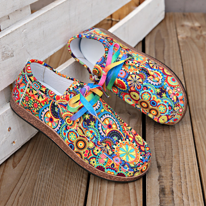 Damen Bequeme Plateau-Slipper im Ethno‑Print mit Korkoptik‑Sohle Drune