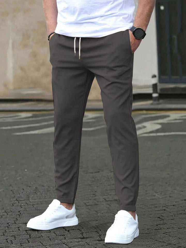 Herren Slim-Fit Jogginghose mit Kordelzug, Seitentaschen und schmalem Knöchelabschluss Drune