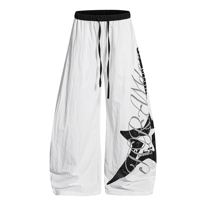 Damen Weite Palazzo-Hose mit Tunnelzugbund und großflächigem Statement-Print Drune